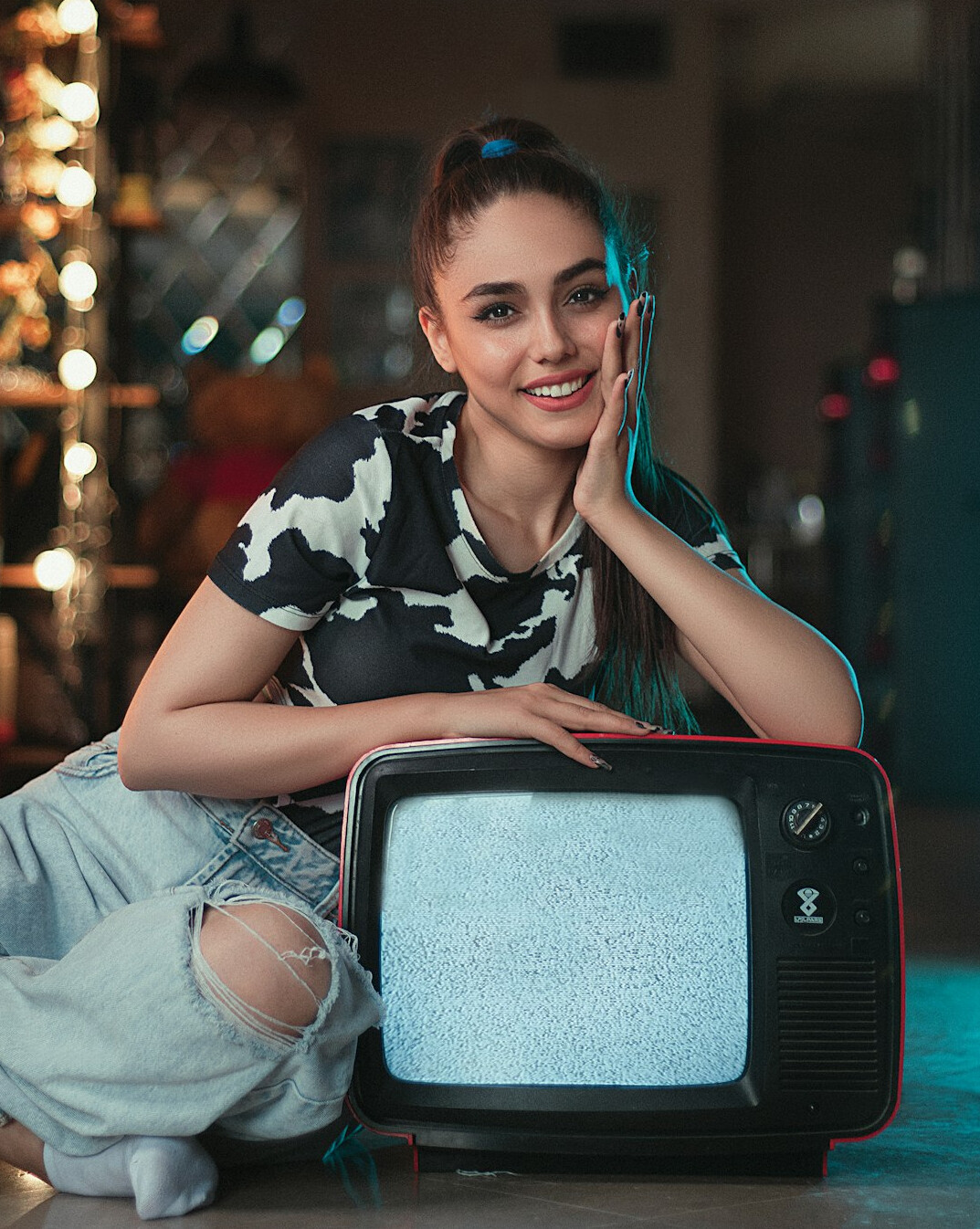 person watching vintage tv