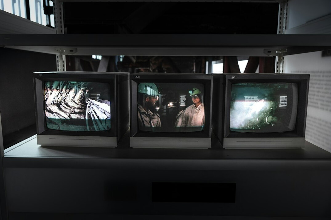 modern tv screen displaying old footage